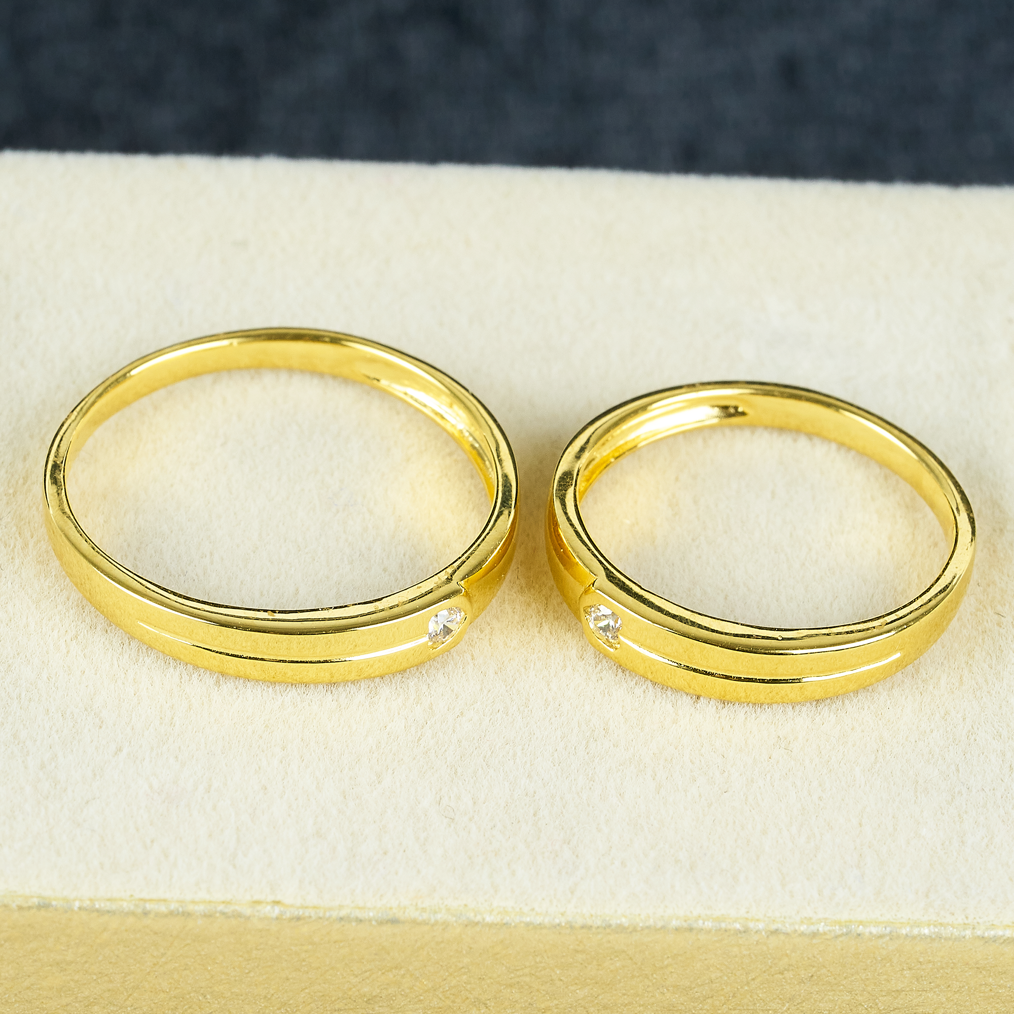 Cặp Nhẫn cưới vàng 61% (14K) đính CZ VNXM00V300023.190 - VNXM00V300024.120