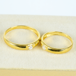 Cặp Nhẫn cưới vàng 61% (14K) đính CZ VNXM00V300002.100 - VNXM00V300001.180