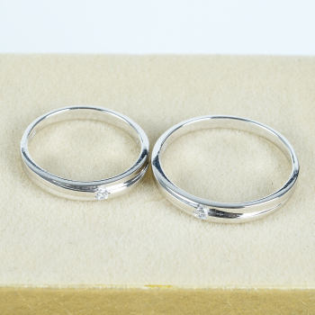 Cặp Nhẫn cưới vàng 75% (18K) đính CZ VNXM00T300002.100 - VNXM00T300002.180